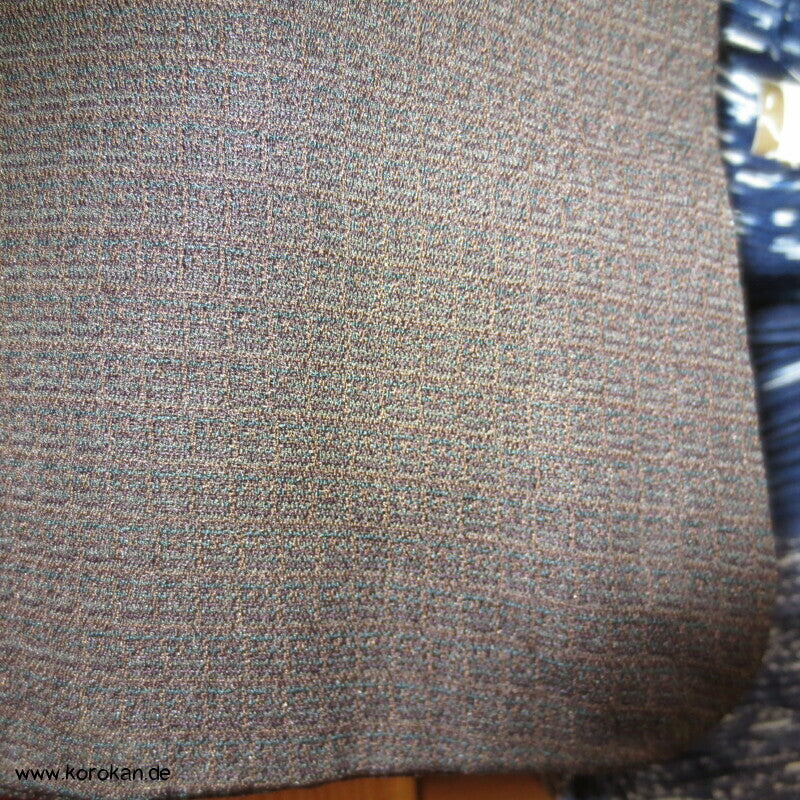 ein gesticktes Mon Komon Kimono