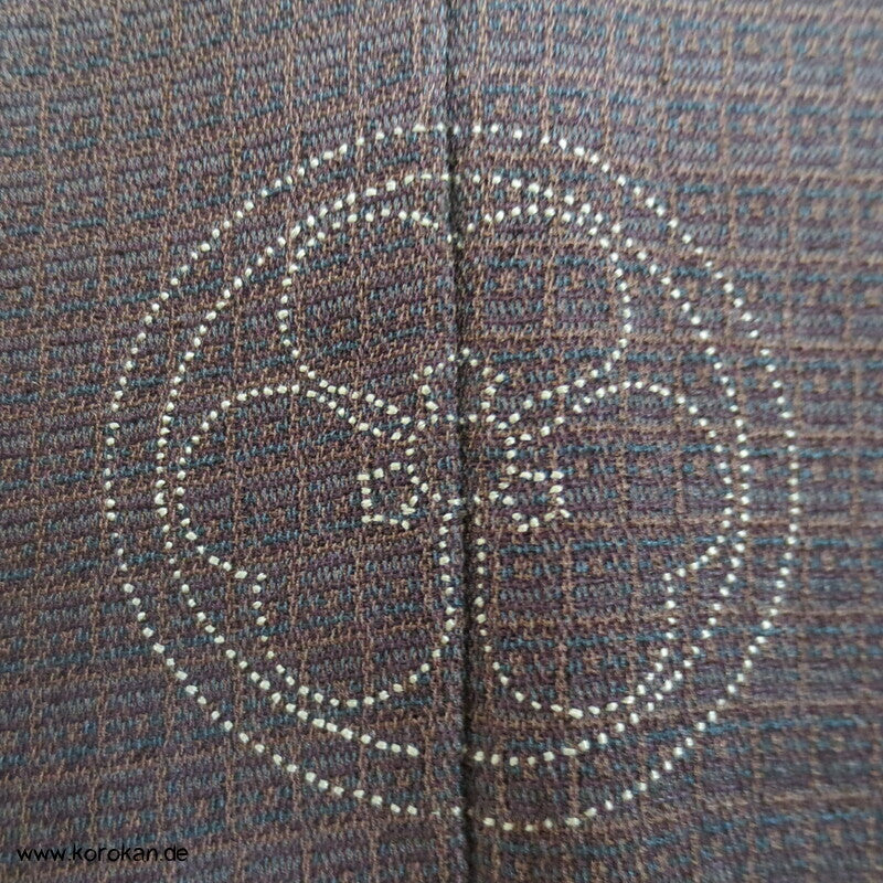 ein gesticktes Mon Komon Kimono