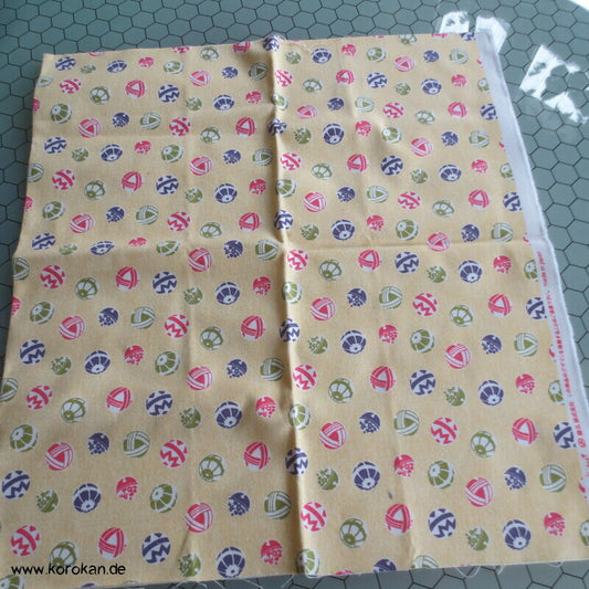 Stoffrest schwere Baumwolle Temaribälle auf hellgelb