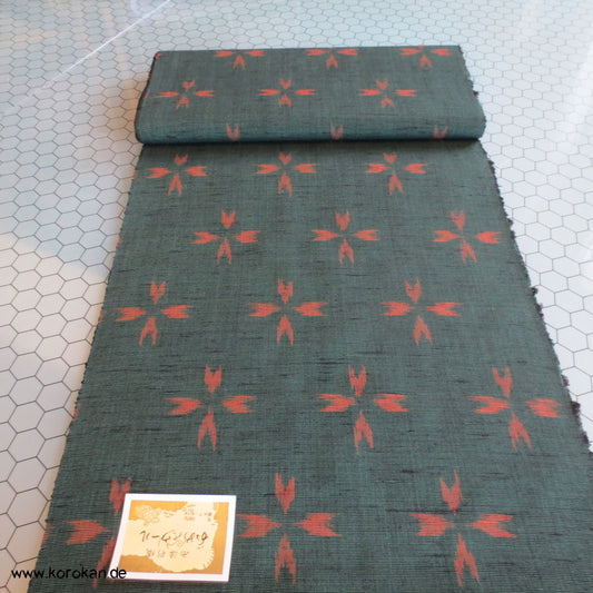 rote Pfeilkreuze Kasuri in dunkelgrün handgewebte Kimono Wolle