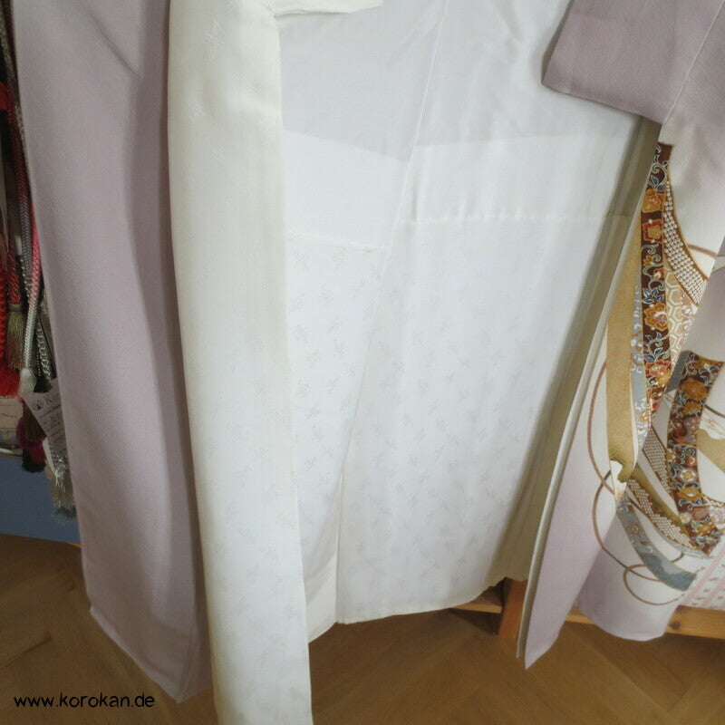 Noshibündel auf blasslila Seidencrepe Iro Tomesode Kimono