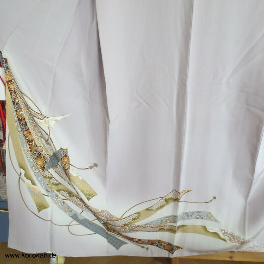 Noshibündel auf blasslila Seidencrepe Iro Tomesode Kimono