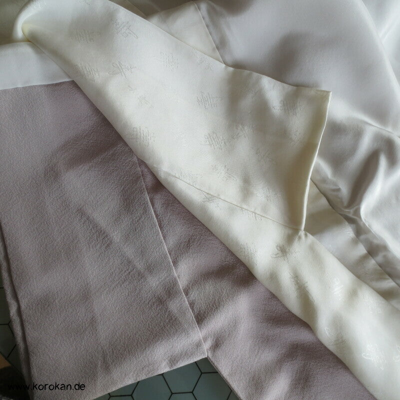 Noshibündel auf blasslila Seidencrepe Iro Tomesode Kimono