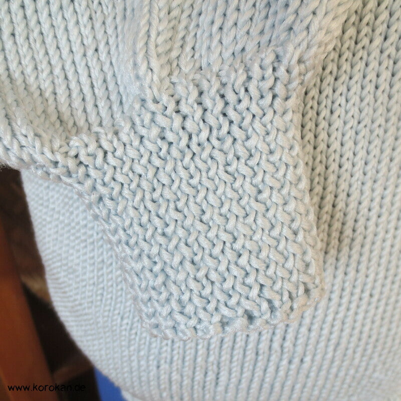 handgestrickter Pullover mit japanischem knorrigem Winterzweig