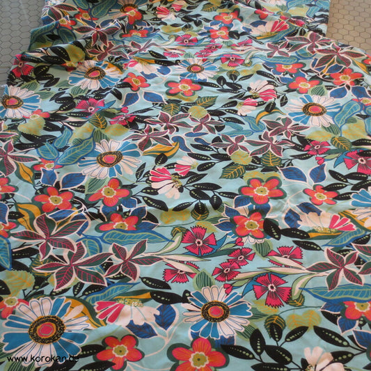 Baumwolljersey Blumen auf blau