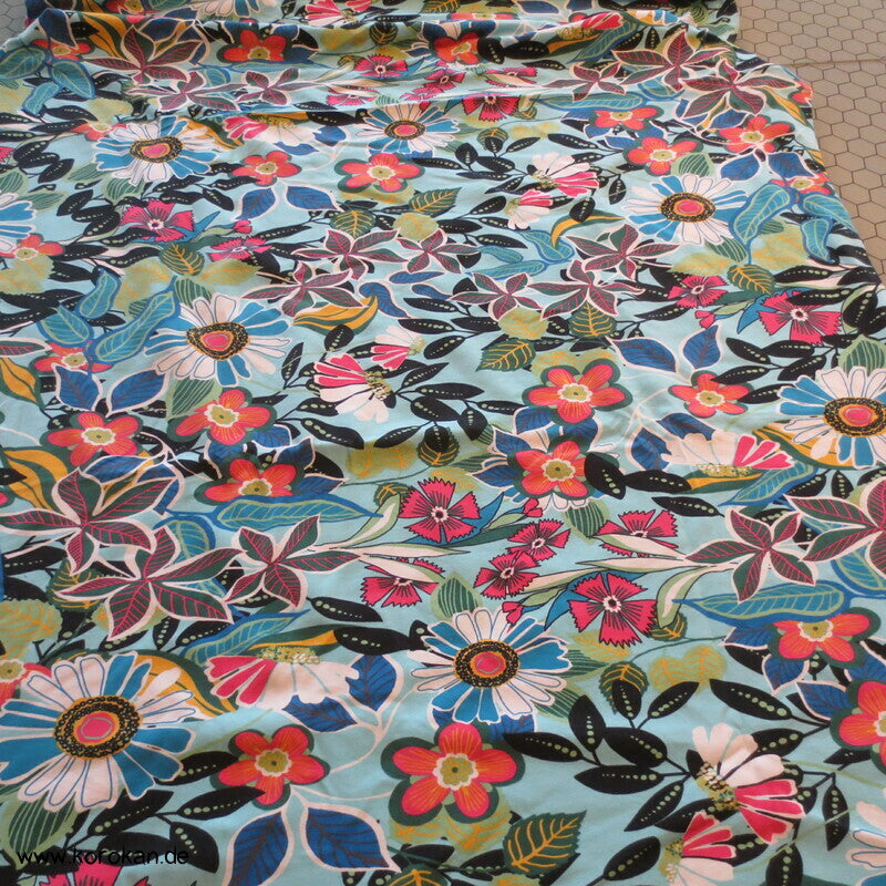 Baumwolljersey Blumen auf blau