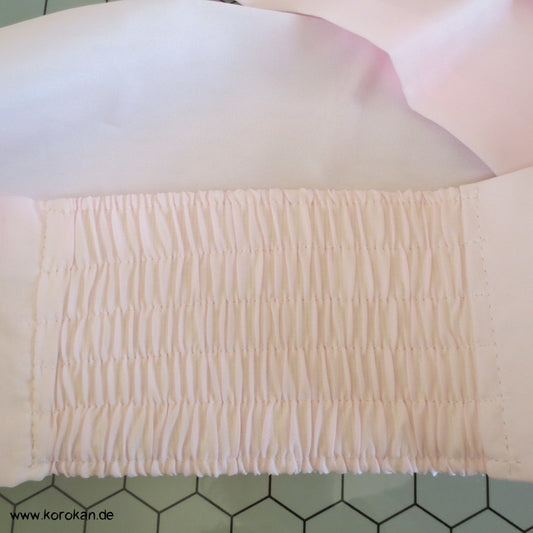 hellrosa Himo mit elastischen Abschnitten