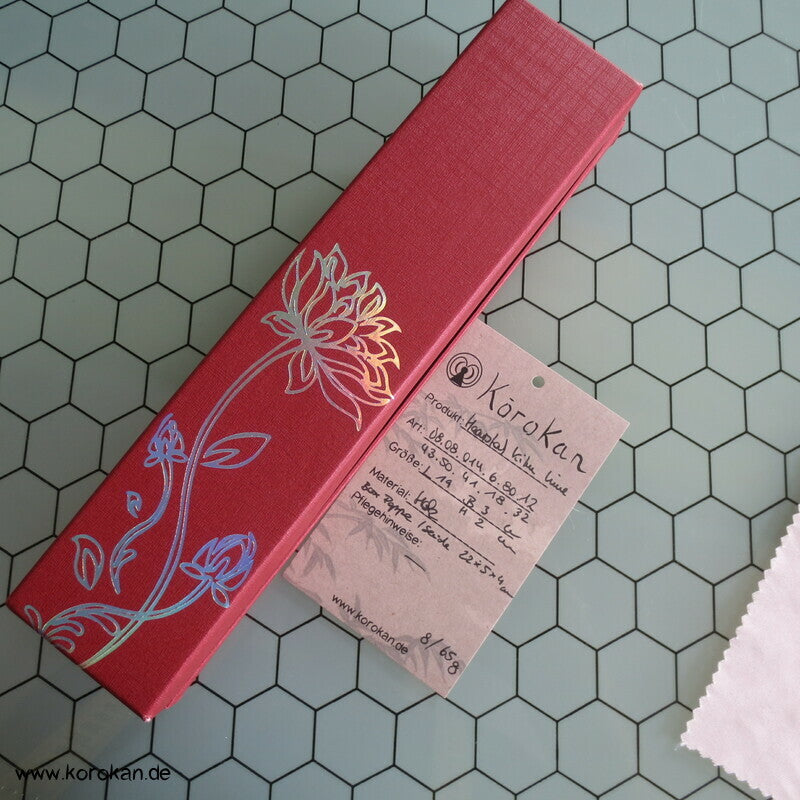 Haarstab grüne Blüte in Box