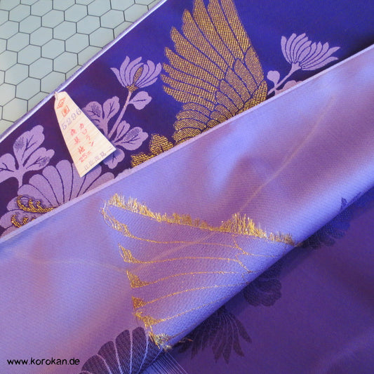 goldene Kraniche auf lila Synthetik Obi / Kimono Brokat