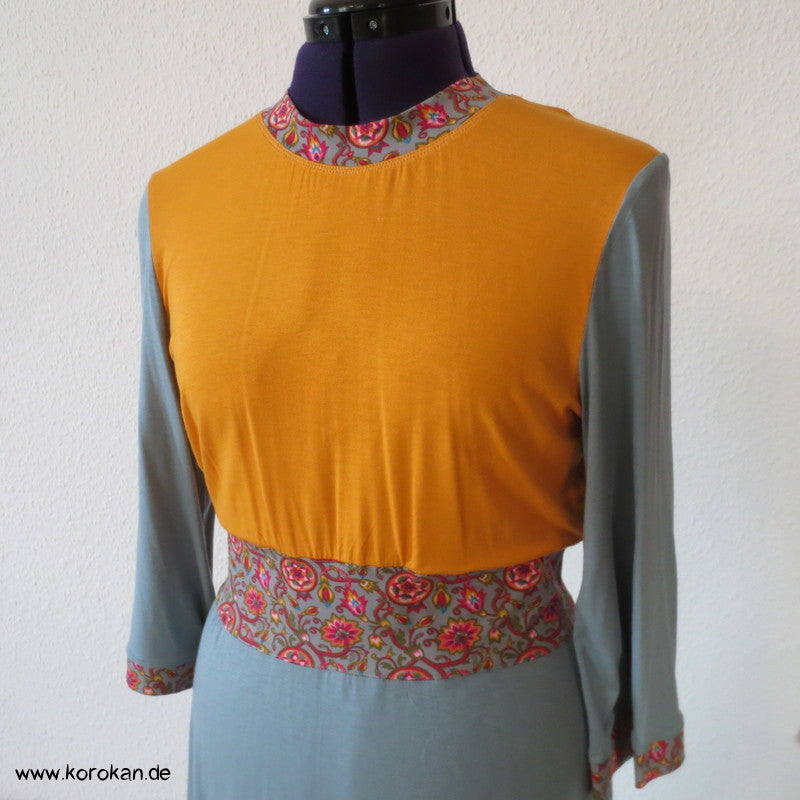 Kombistoffe Jerseykleid, orange, petrol, abgesetzte Kanten
