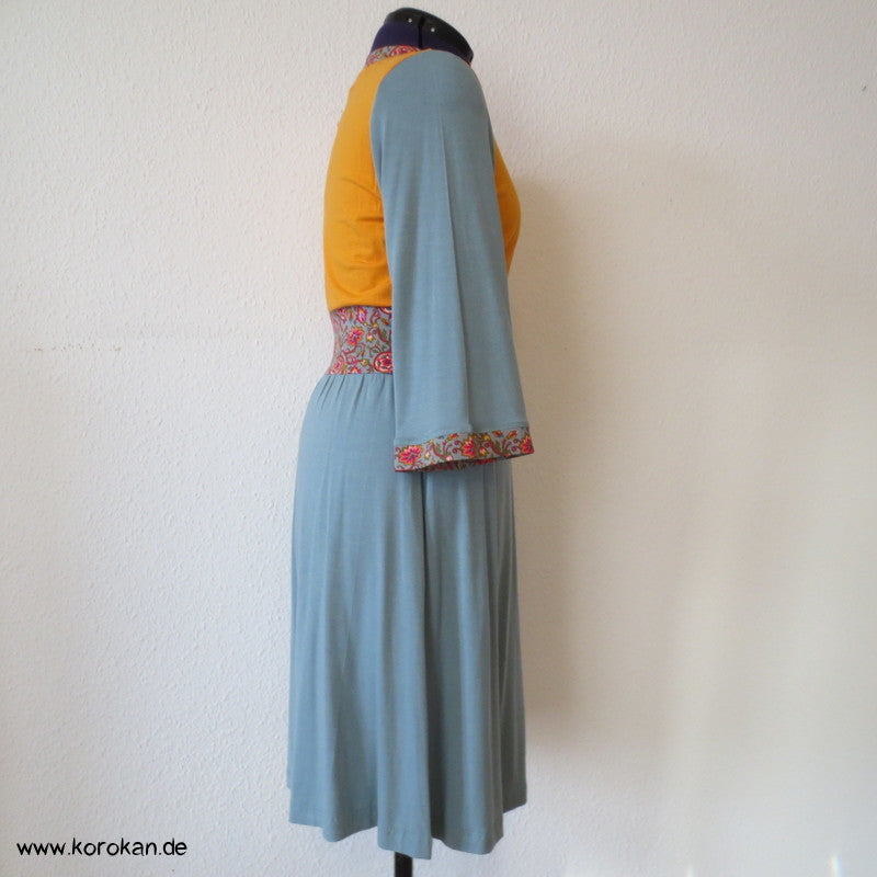 Kombistoffe Jerseykleid, orange, petrol, abgesetzte Kanten