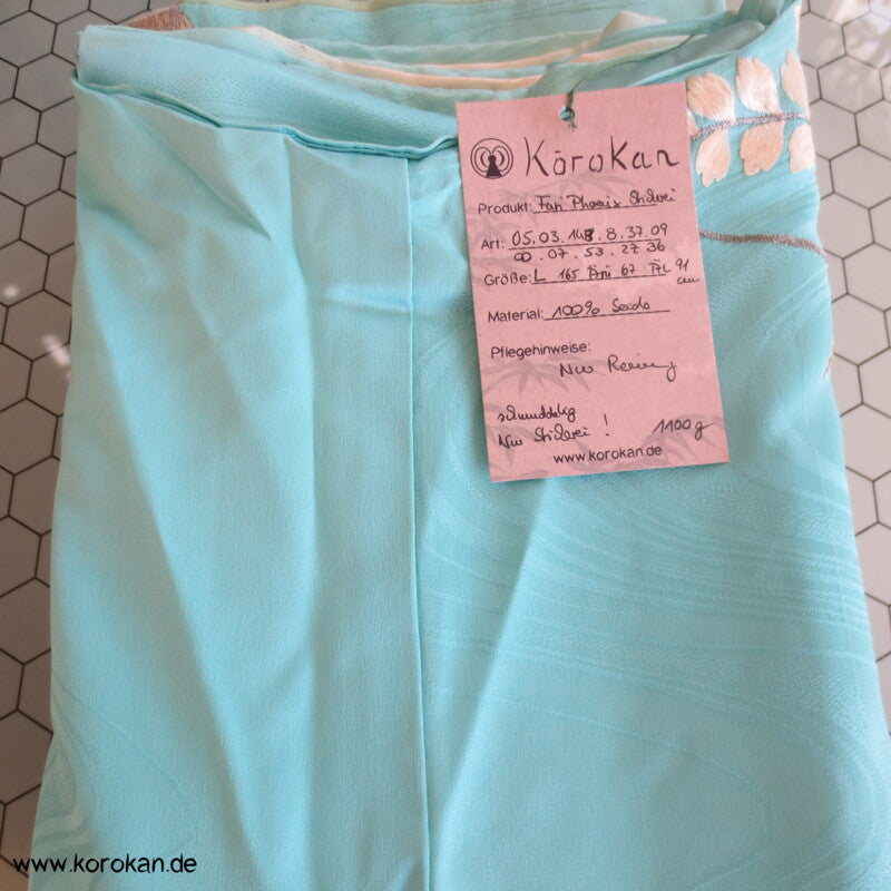 silberne Phönixstickerei auf türkisblauem Seidendamast Furisode