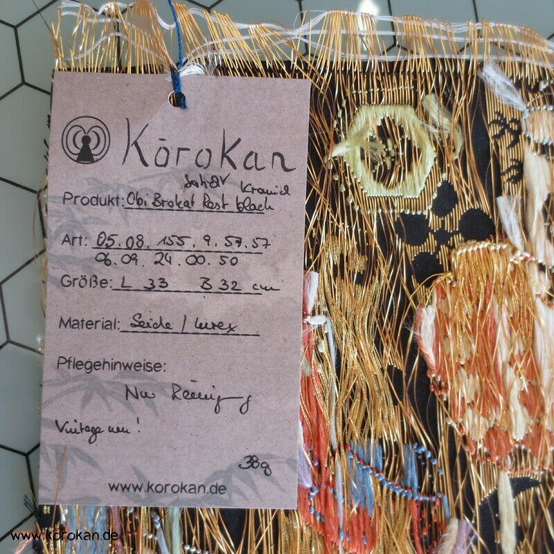 Schätze und Kraniche auf schwarz Seidenbrokat