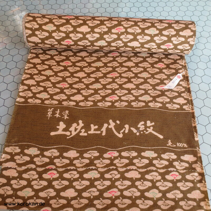 Kamelien auf oliv Kimono Wolle Stoffrolle