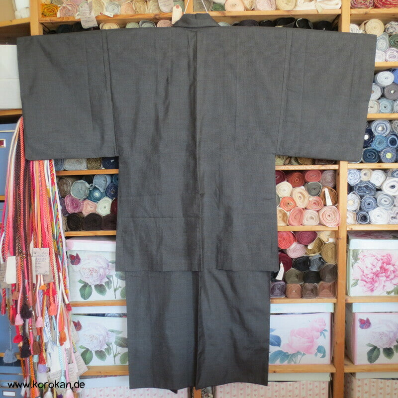 Kimono und Haori Set in blau schwarzer Kasuri Tsumugi Seide, große Welle
