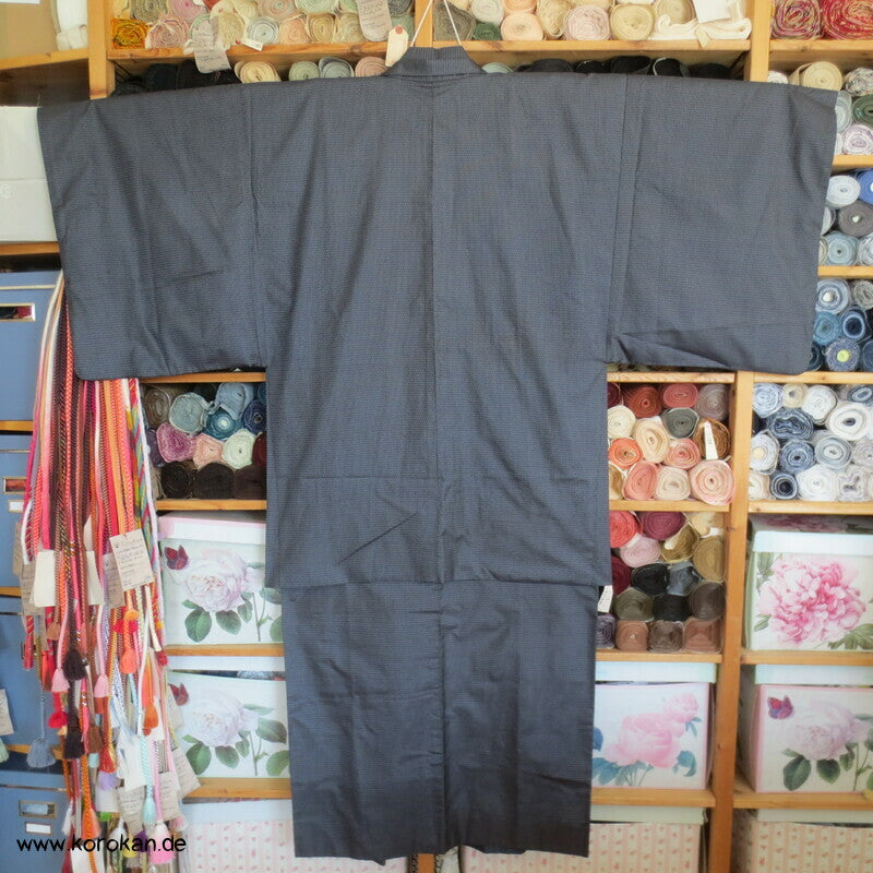 Kimono und Haori Set in blau schwarzer Kasuri Tsumugi Seide, Greifvogel Futter