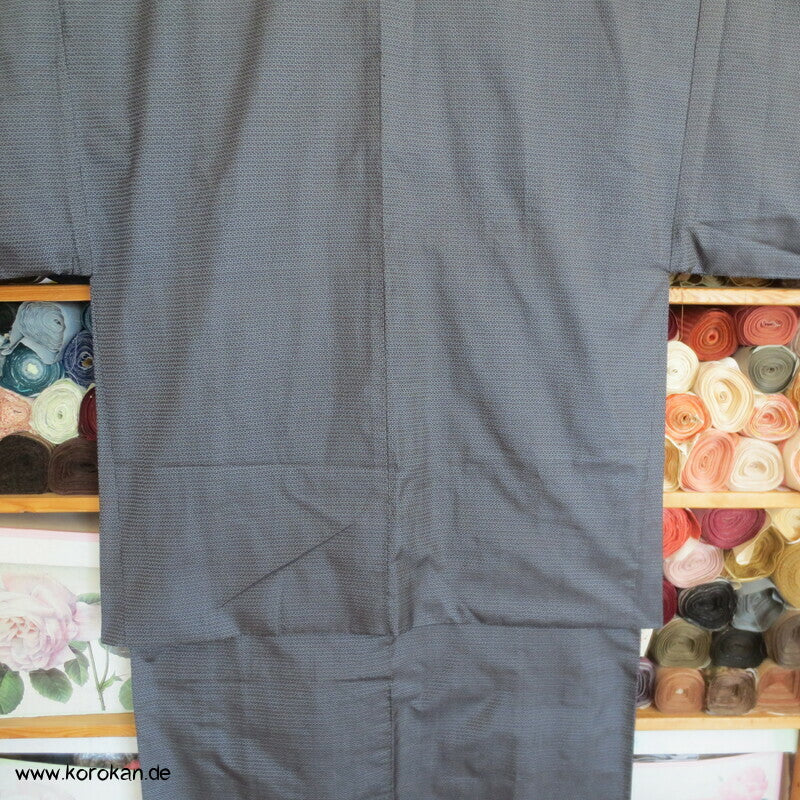 Kimono und Haori Set in blau schwarzer Kasuri Tsumugi Seide, Greifvogel Futter