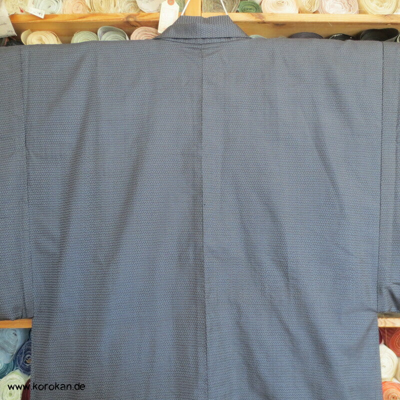 Kimono und Haori Set in blau schwarzer Kasuri Tsumugi Seide, Greifvogel Futter