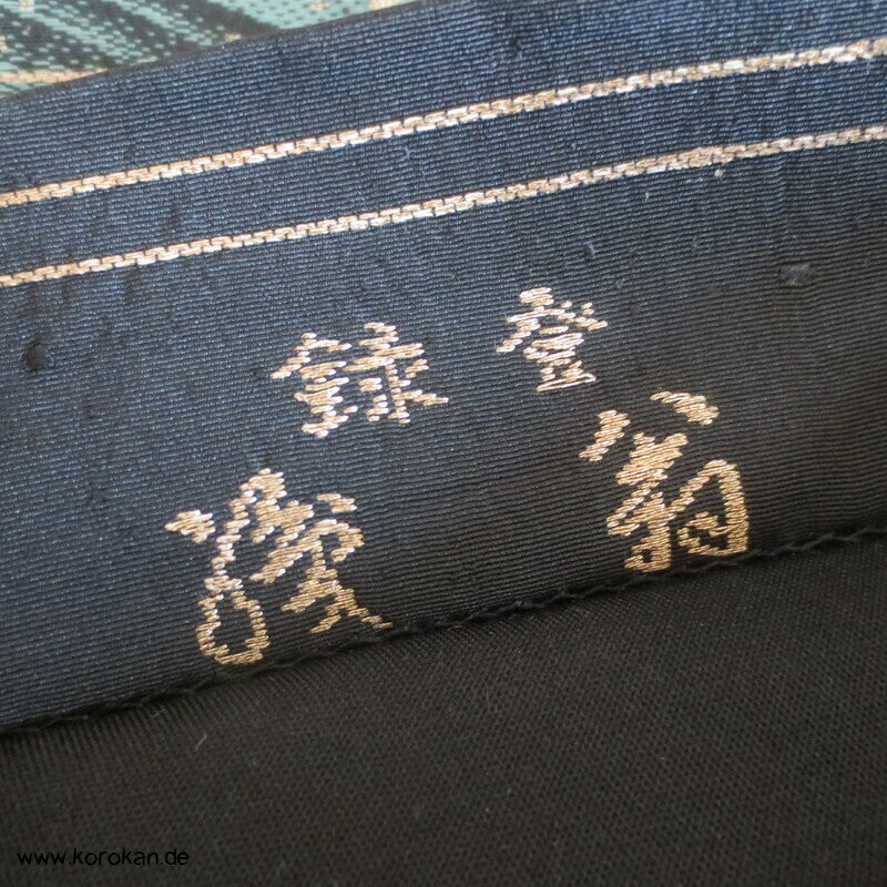 goldener Wellenschaum vor schwarz Fukuro Obi