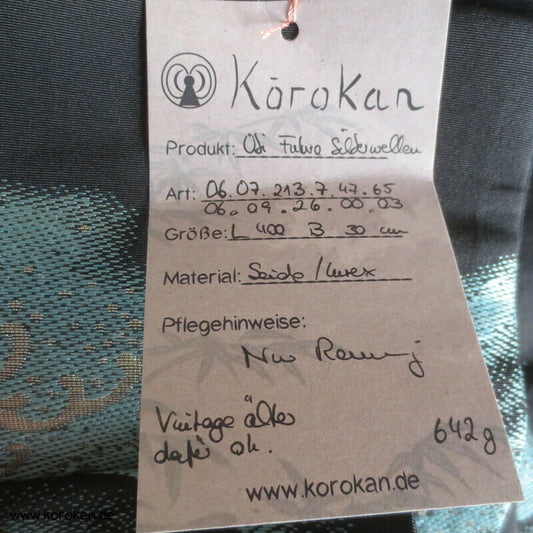 goldener Wellenschaum vor schwarz Fukuro Obi