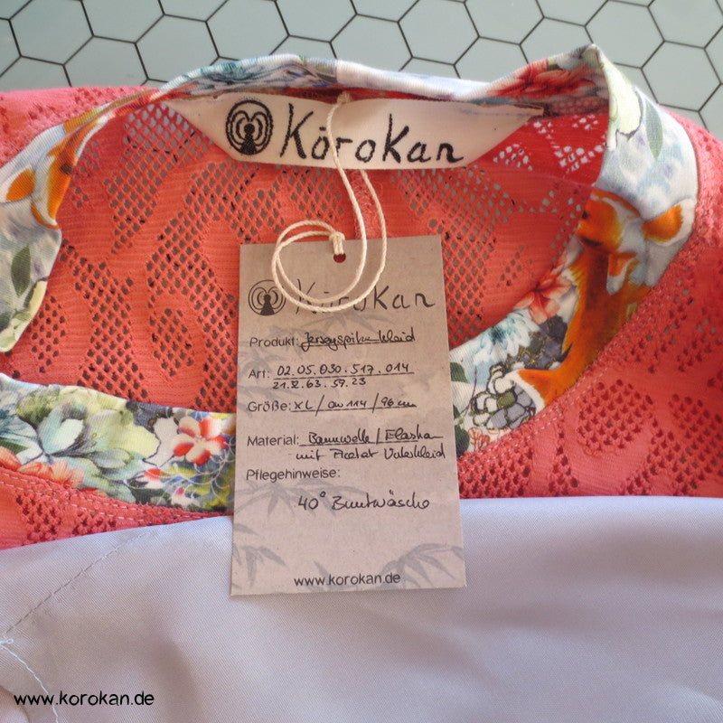 Baumwollspitzenjersey, farblich abgesetzte Koi-Blenden Kleid
