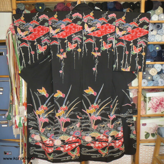 bunte Muster auf schwarzer Seide Homongi Kimono