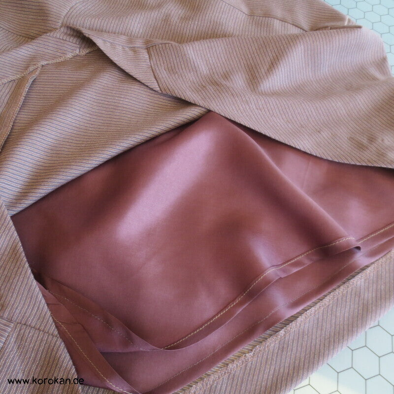 Woll Patchwork Bias Cut Rock