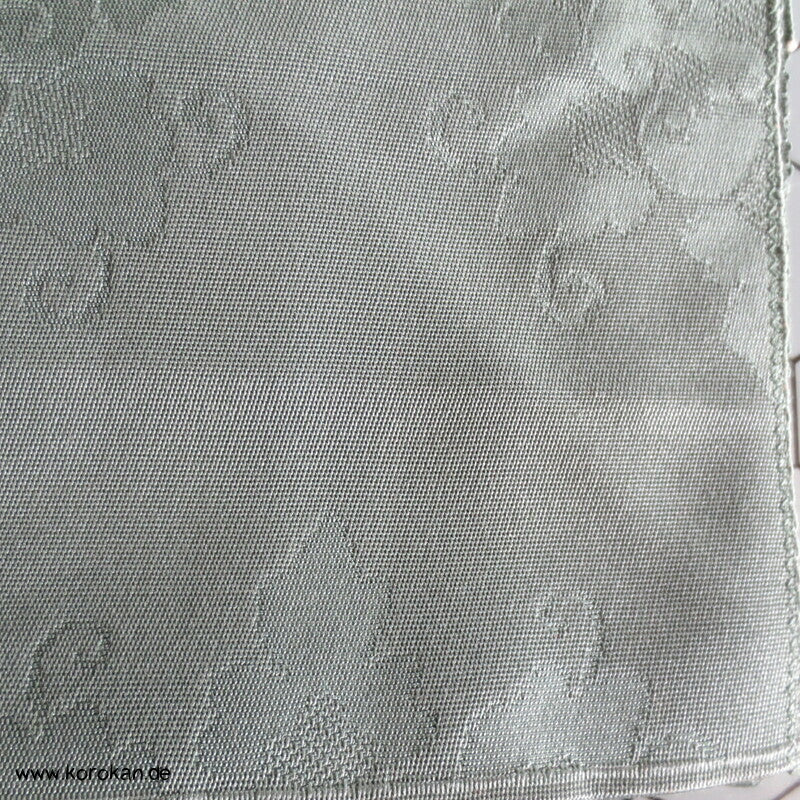 Ornamente in dunkeljade, feiner leichter Nagoya Obi