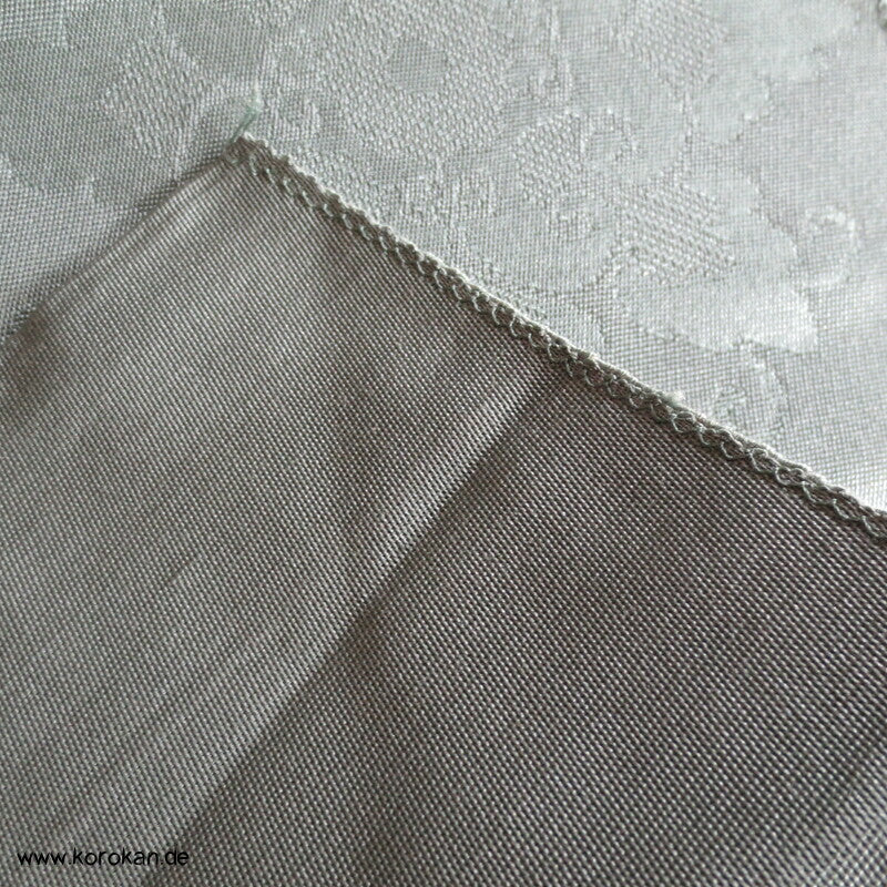 Ornamente in dunkeljade, feiner leichter Nagoya Obi