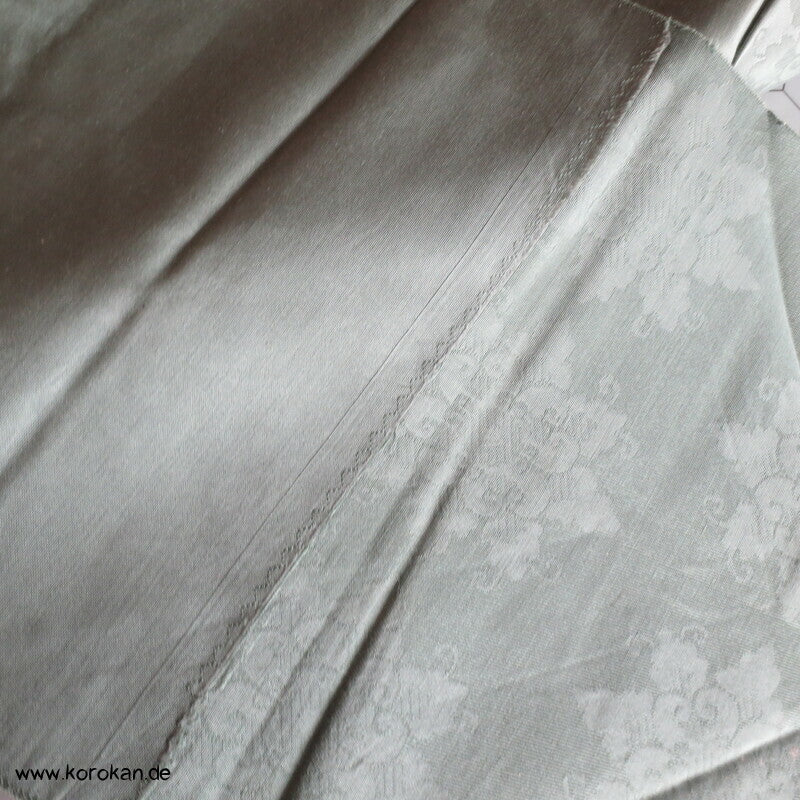 Ornamente in dunkeljade, feiner leichter Nagoya Obi