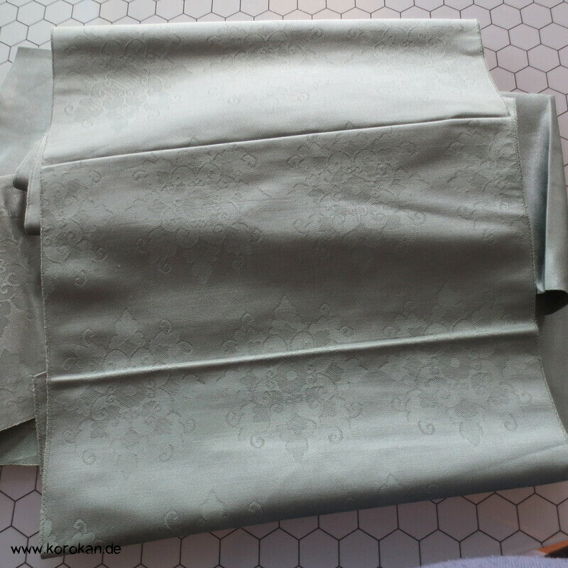 Ornamente in dunkeljade, feiner leichter Nagoya Obi