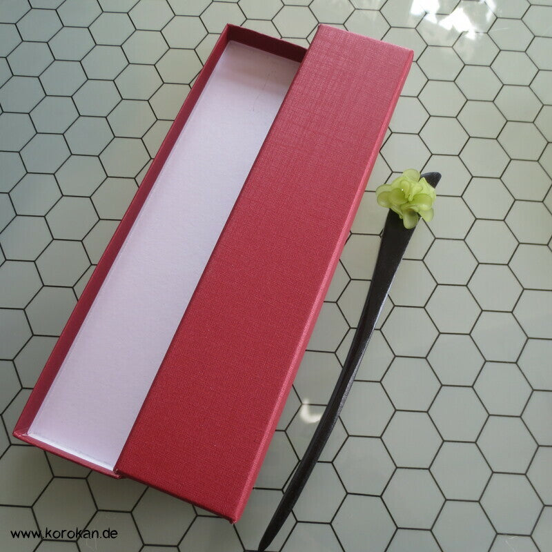 Haarstab grüne Blüte in Box