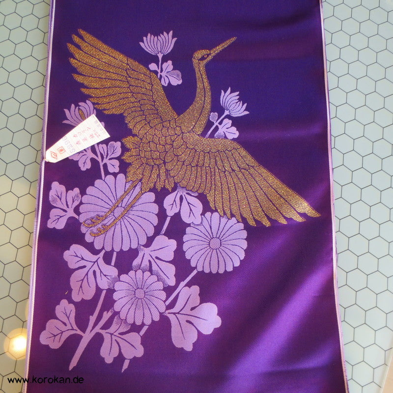 goldene Kraniche auf lila Synthetik Obi / Kimono Brokat