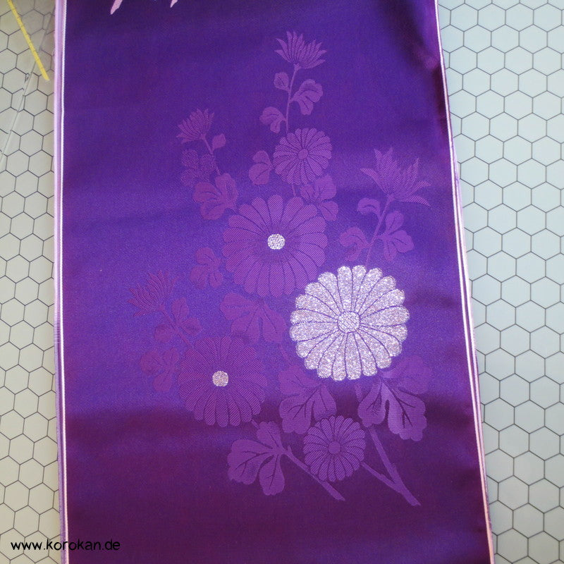 goldene Kraniche auf lila Synthetik Obi / Kimono Brokat