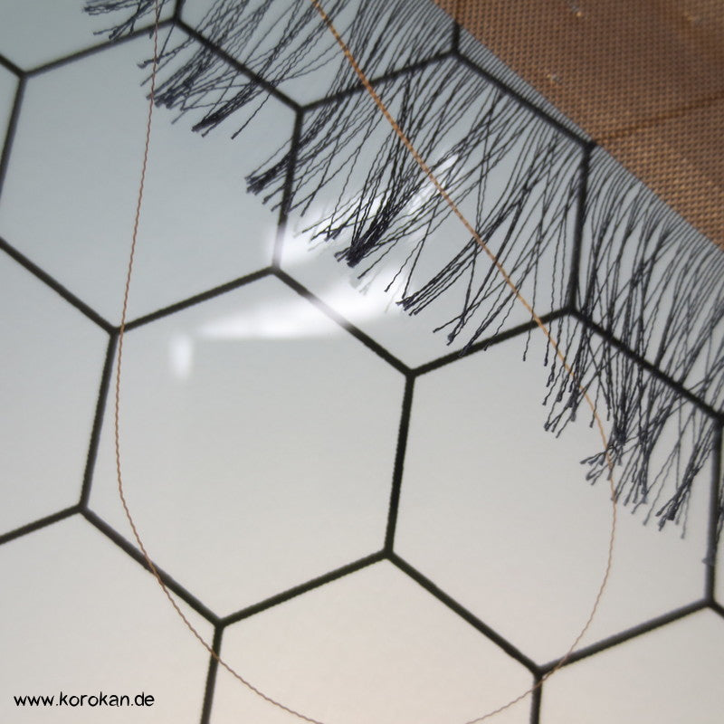 halbtransparente schwarz goldene Seide